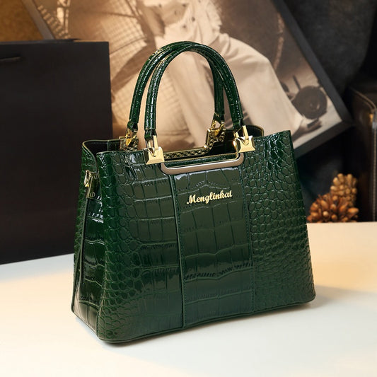 Elevate your fashion statement with a green Menglinkai snakeskin-like handbag, crafted from luxurious crocodile skin.