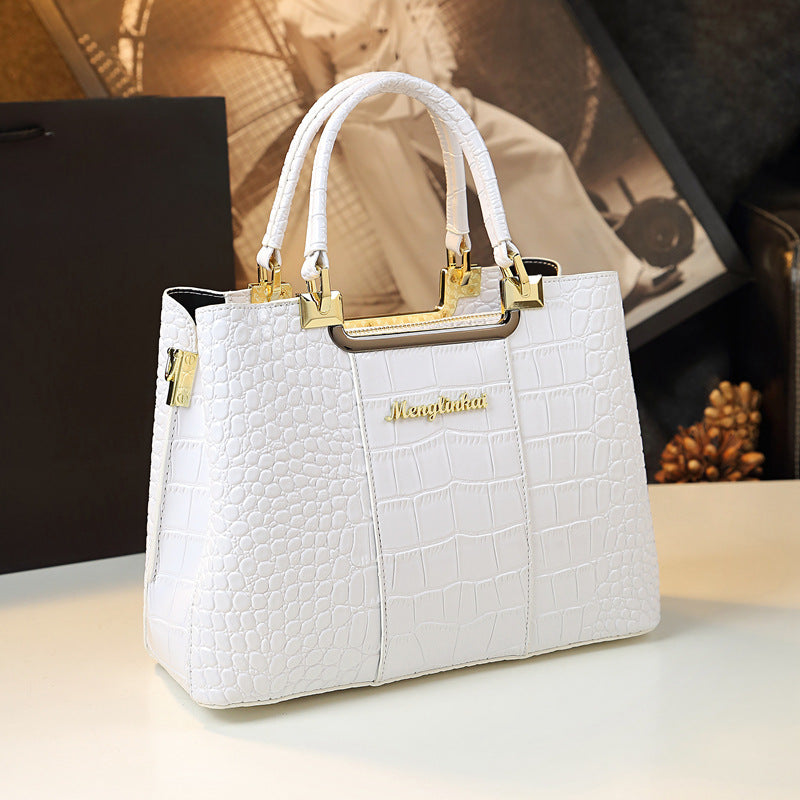 Elevate your fashion statement with a white Menglinkai snakeskin-like handbag, crafted from luxurious crocodile skin